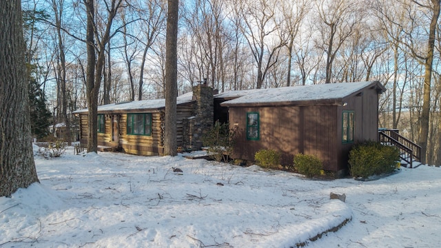 view of front of home with a chimney