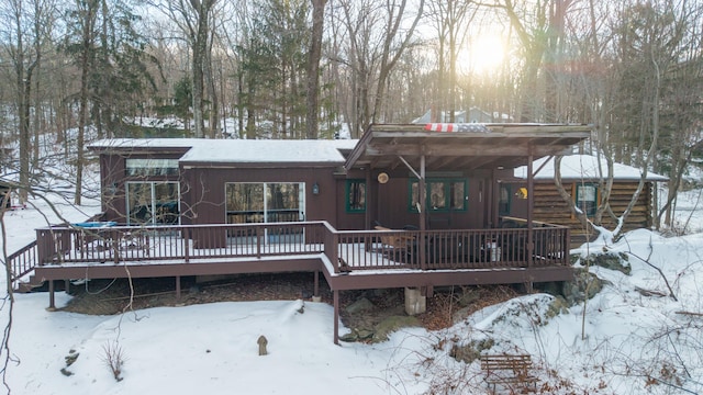 view of front of home featuring a wooden deck