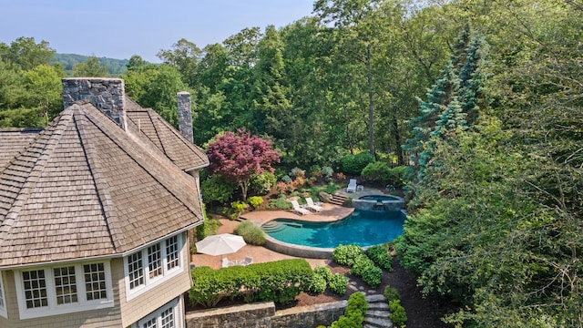 4 Hemlock Rdg, Weston, CT 06883 - outdoor pool with an in-ground hot tub and a patio area