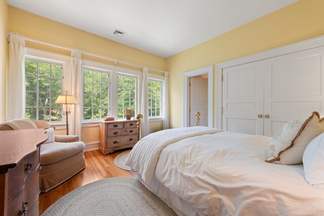 4 Hemlock Rdg, Weston, CT 06883 - bedroom featuring light wood-style flooring and a closet