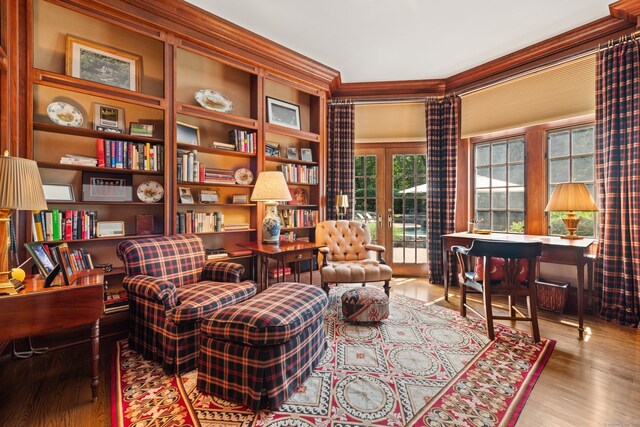 4 Hemlock Rdg, Weston, CT 06883 - sitting room with ornamental molding, wood finished floors, and built in shelves