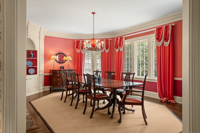 4 Hemlock Rdg, Weston, CT 06883 - dining space with wallpapered walls, crown molding, a chandelier, and wood finished floors