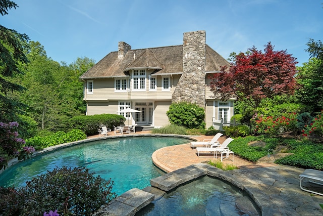 4 Hemlock Rdg, Weston, CT 06883 - view of swimming pool featuring french doors, a patio area, and a pool with connected hot tub