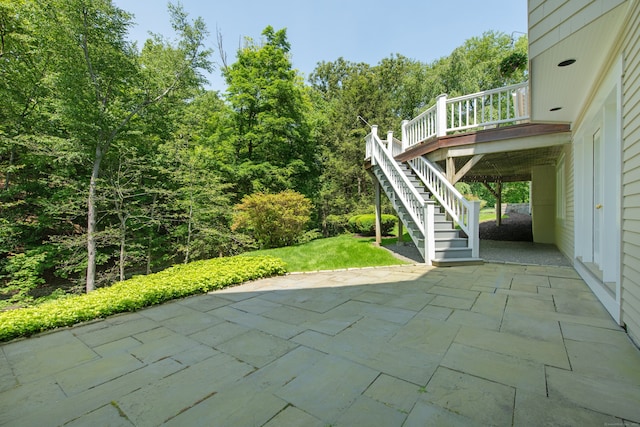 4 Hemlock Rdg, Weston, CT 06883 - view of patio / terrace with stairway, a wooden deck, and a wooded view