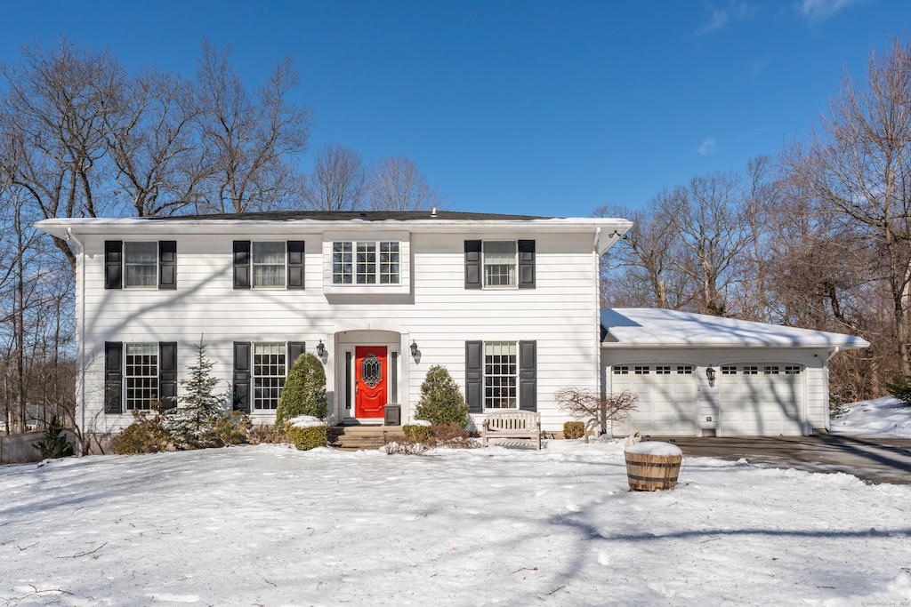 27 Lancelot Dr, North Haven, CT 06473 - view of front of house with an attached garage