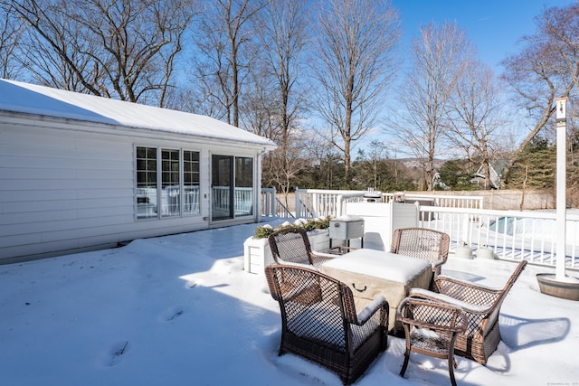 view of snow covered patio