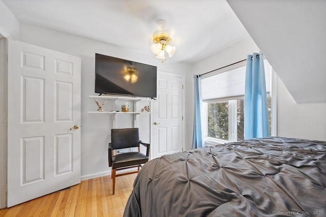 bedroom featuring wood finished floors