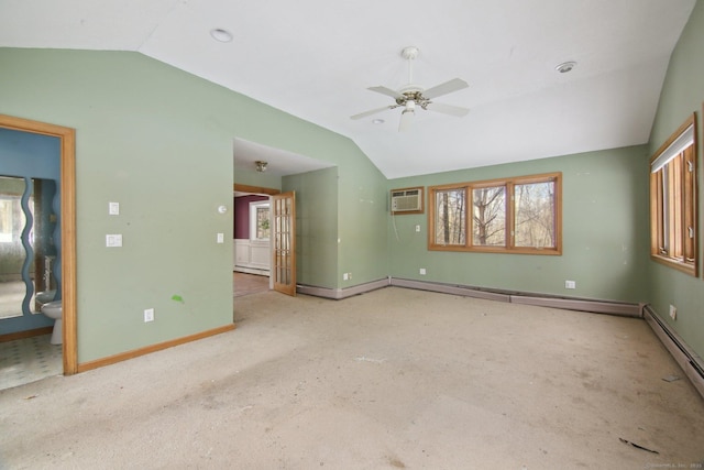 empty room featuring baseboards, lofted ceiling, a baseboard radiator, ceiling fan, and a baseboard heating unit