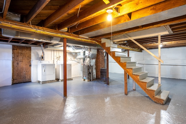 basement with independent washer and dryer and heating unit