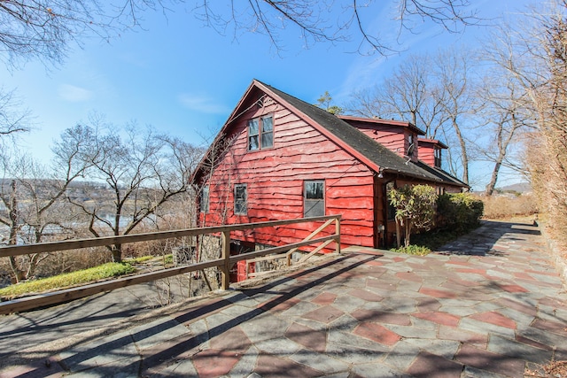 279 Candlewood Lake Rd, Brookfield, CT 06804 - view of side of property with roof with shingles