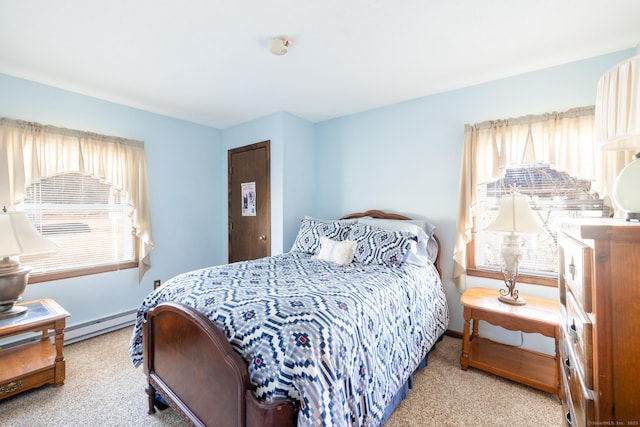 bedroom featuring multiple windows and light colored carpet