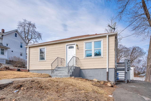 view of front of house with fence