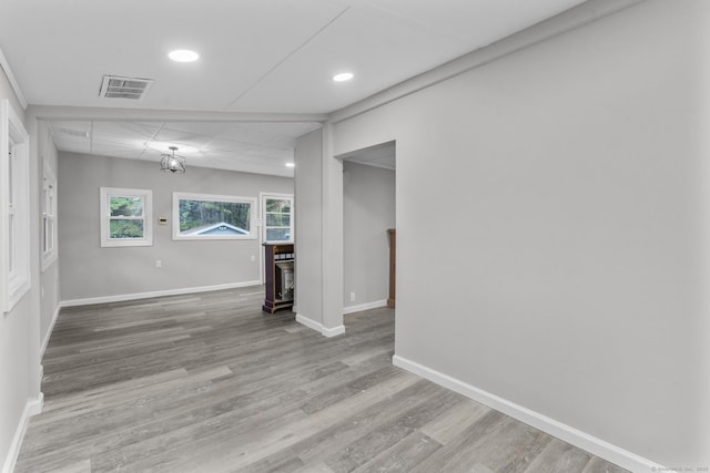 unfurnished room featuring light hardwood / wood-style floors