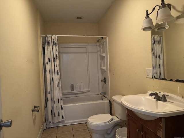 full bath featuring toilet, tile patterned flooring, shower / bath combo, and vanity