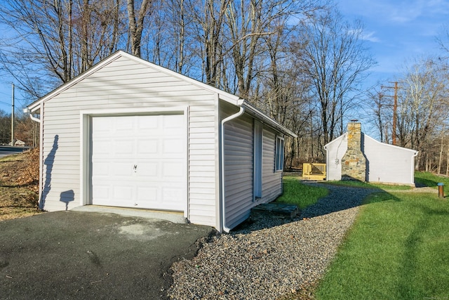 garage with a yard