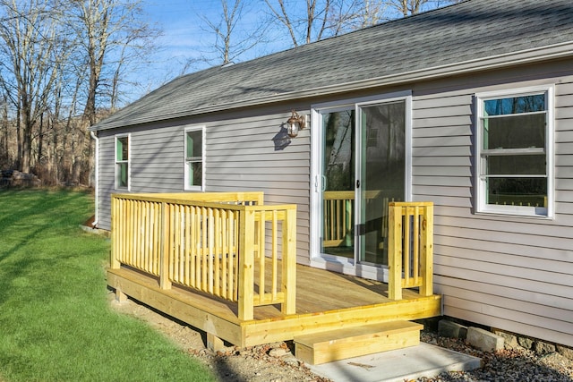 deck featuring a lawn