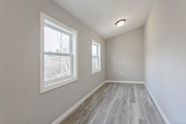 unfurnished room featuring light hardwood / wood-style floors