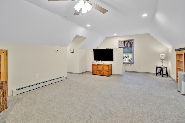 bonus room with light colored carpet, a baseboard radiator, and vaulted ceiling