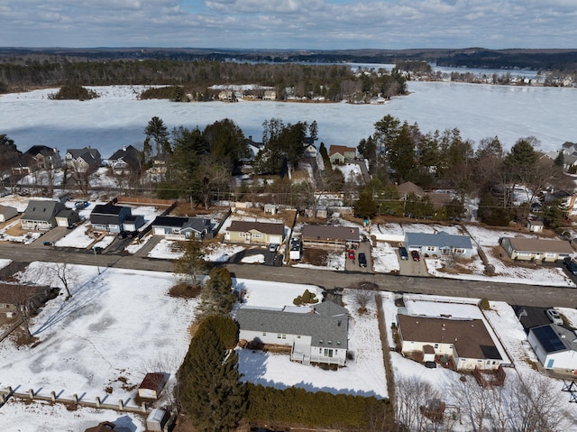 snowy aerial view featuring a residential view