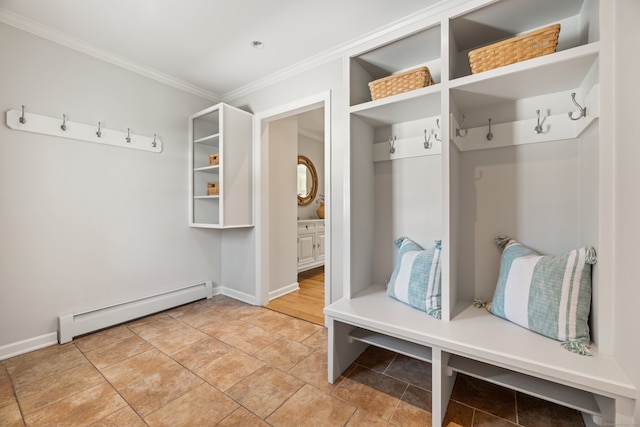 mudroom featuring baseboards, ornamental molding, and baseboard heating