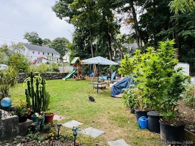 view of yard with a playground