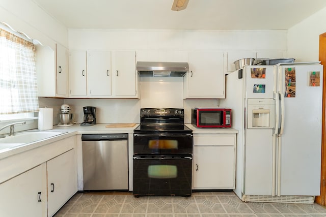 kitchen with black electric range oven, wall chimney range hood, white refrigerator with ice dispenser, light countertops, and dishwasher