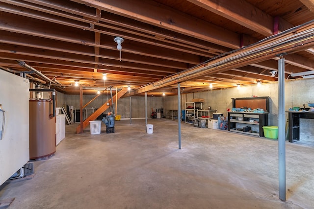 unfinished below grade area with stairway and water heater