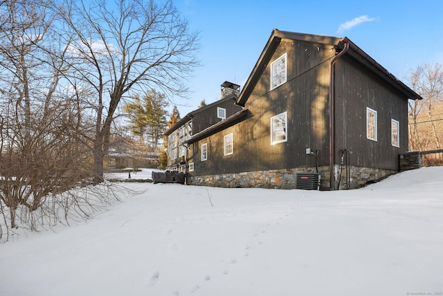 view of snow covered property