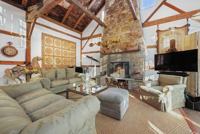 living room with high vaulted ceiling, beam ceiling, a fireplace, and wood ceiling