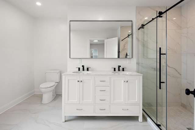 full bath with toilet, marble finish floor, a marble finish shower, and a sink