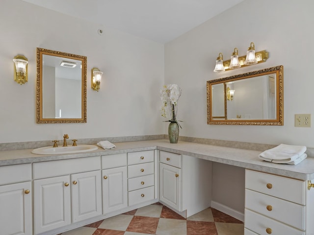 bathroom with visible vents and vanity
