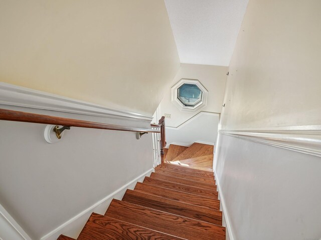 776 Bethany Mountain Rd, Cheshire, CT 06410 - staircase featuring wood finished floors and vaulted ceiling