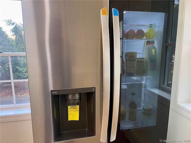 interior details featuring fridge