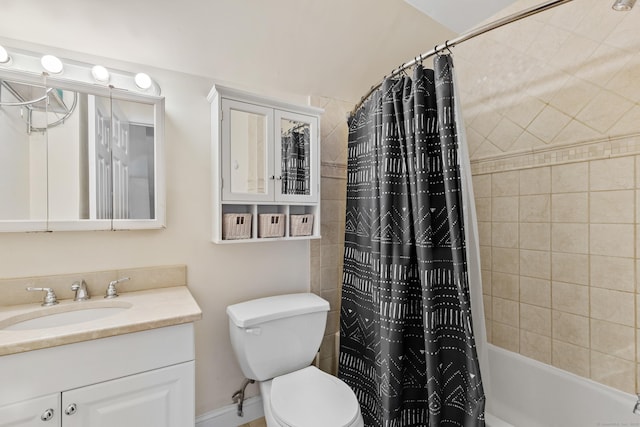 bathroom featuring shower / bath combo, vanity, and toilet