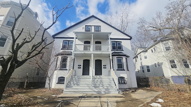 view of front facade with a balcony