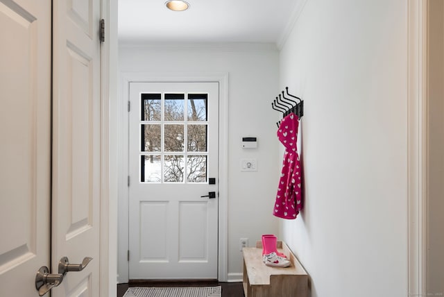 entryway featuring ornamental molding