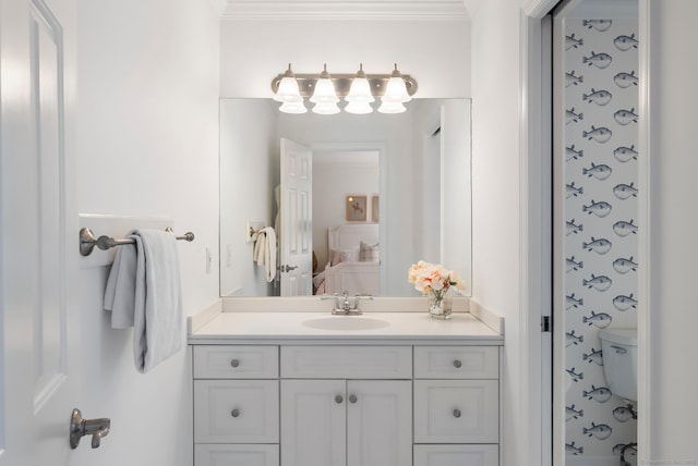 bathroom featuring vanity and crown molding