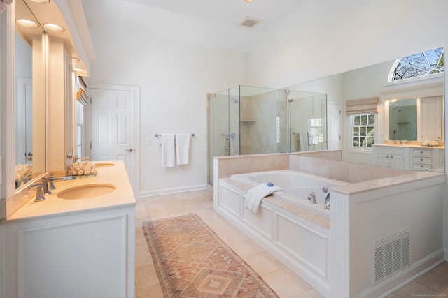 full bath featuring a stall shower, visible vents, a sink, and a tub with jets