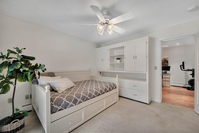 bedroom featuring a baseboard heating unit, baseboard heating, a ceiling fan, and light colored carpet