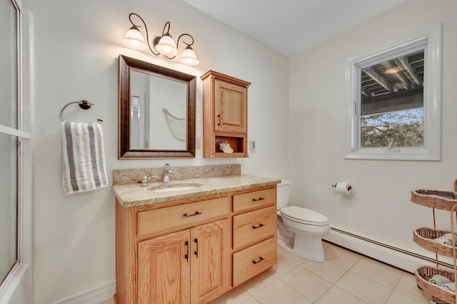 bathroom featuring toilet, tile patterned floors, a baseboard radiator, and vanity