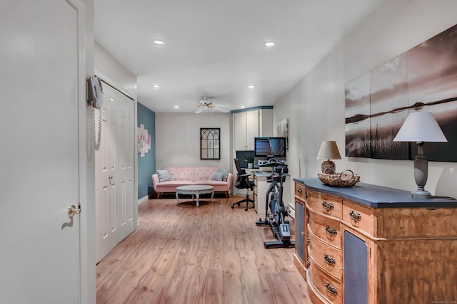 interior space with light wood finished floors, baseboards, a ceiling fan, and recessed lighting