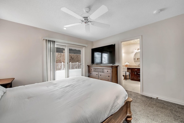 bedroom featuring a textured ceiling, access to outside, a ceiling fan, and ensuite bathroom