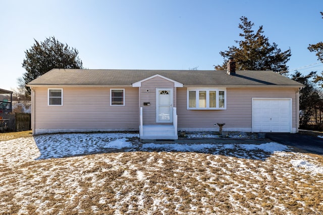 single story home with a garage