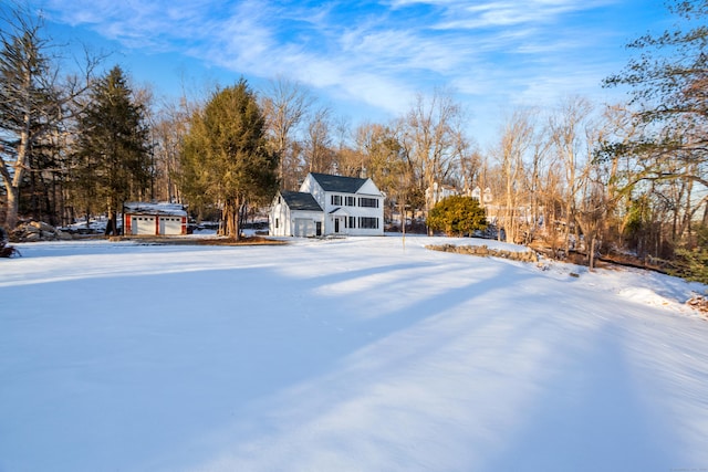 view of yard covered in snow