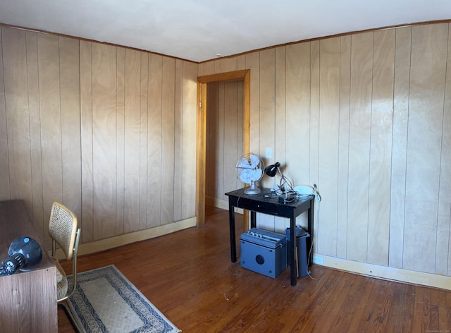 home office featuring wood finished floors and baseboards