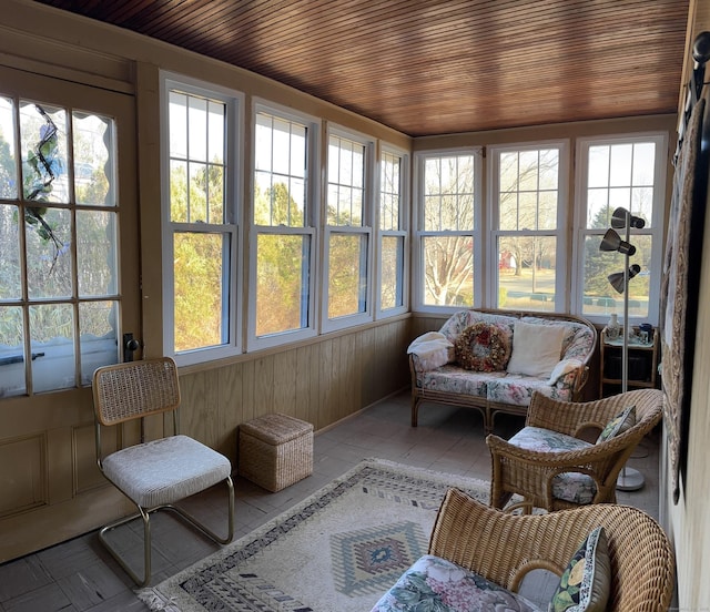 sunroom / solarium featuring wooden ceiling