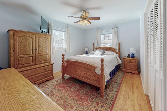 bedroom featuring a ceiling fan and light wood finished floors