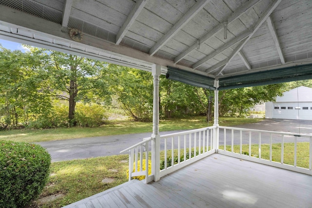 wooden terrace with a porch