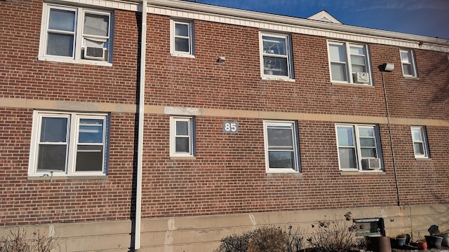 view of home's exterior featuring cooling unit