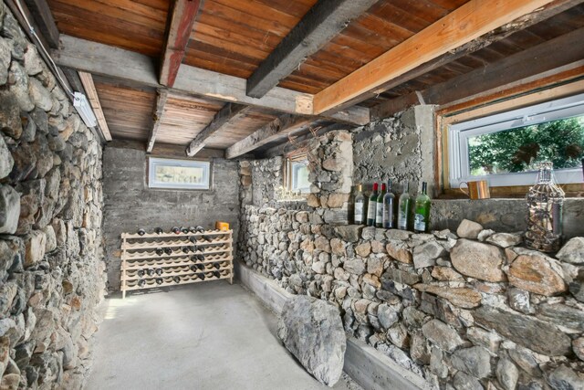 basement with wooden ceiling